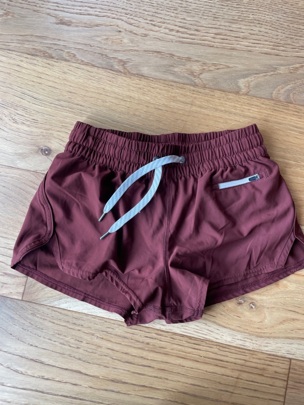 Vuori Women's Burgundy Athletic Shorts with Drawstring